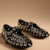 HOLED BLACK WITH GOLD/SILVER GROMMETS